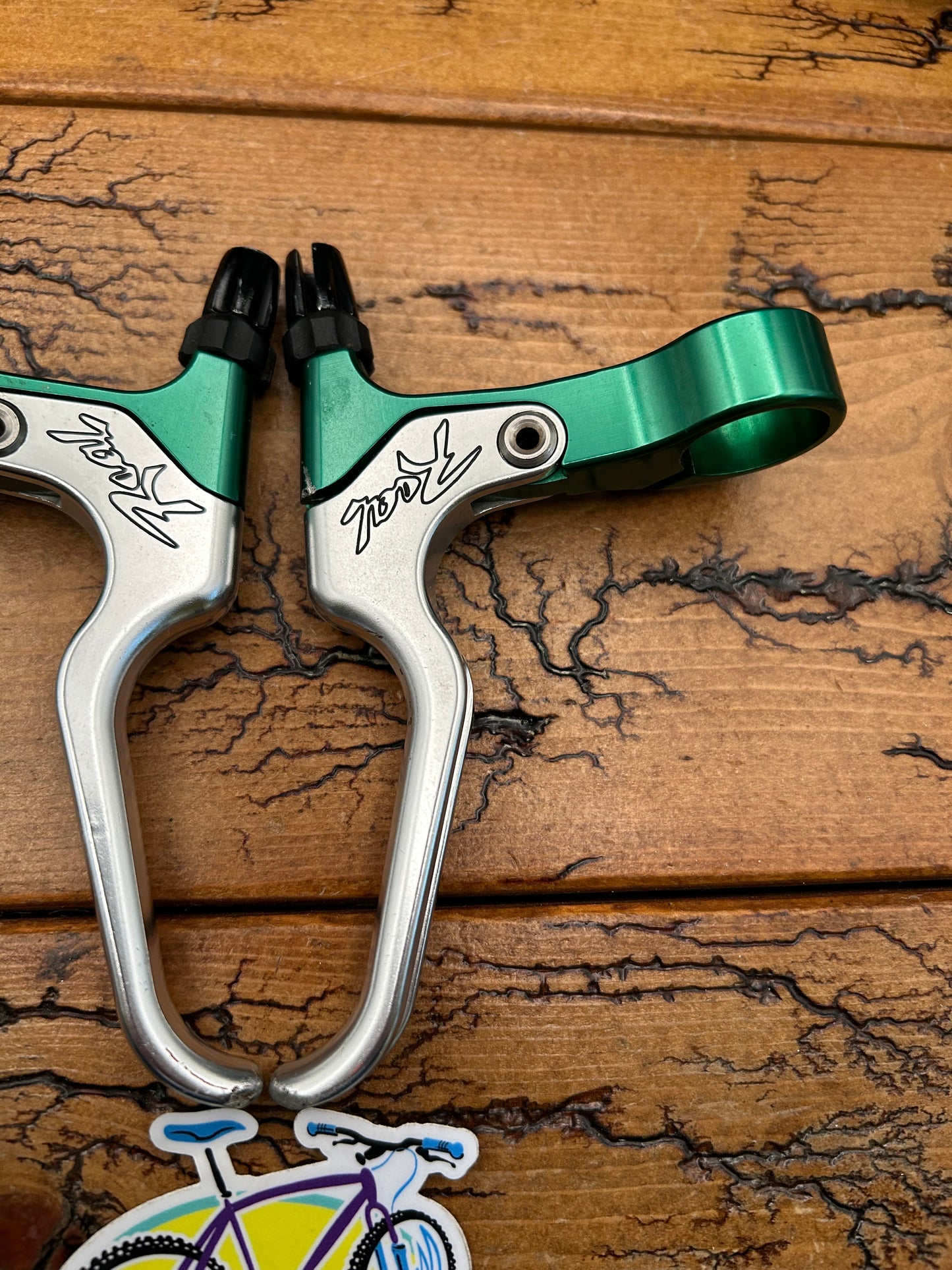 Real Design Silver and Green Brake Levers